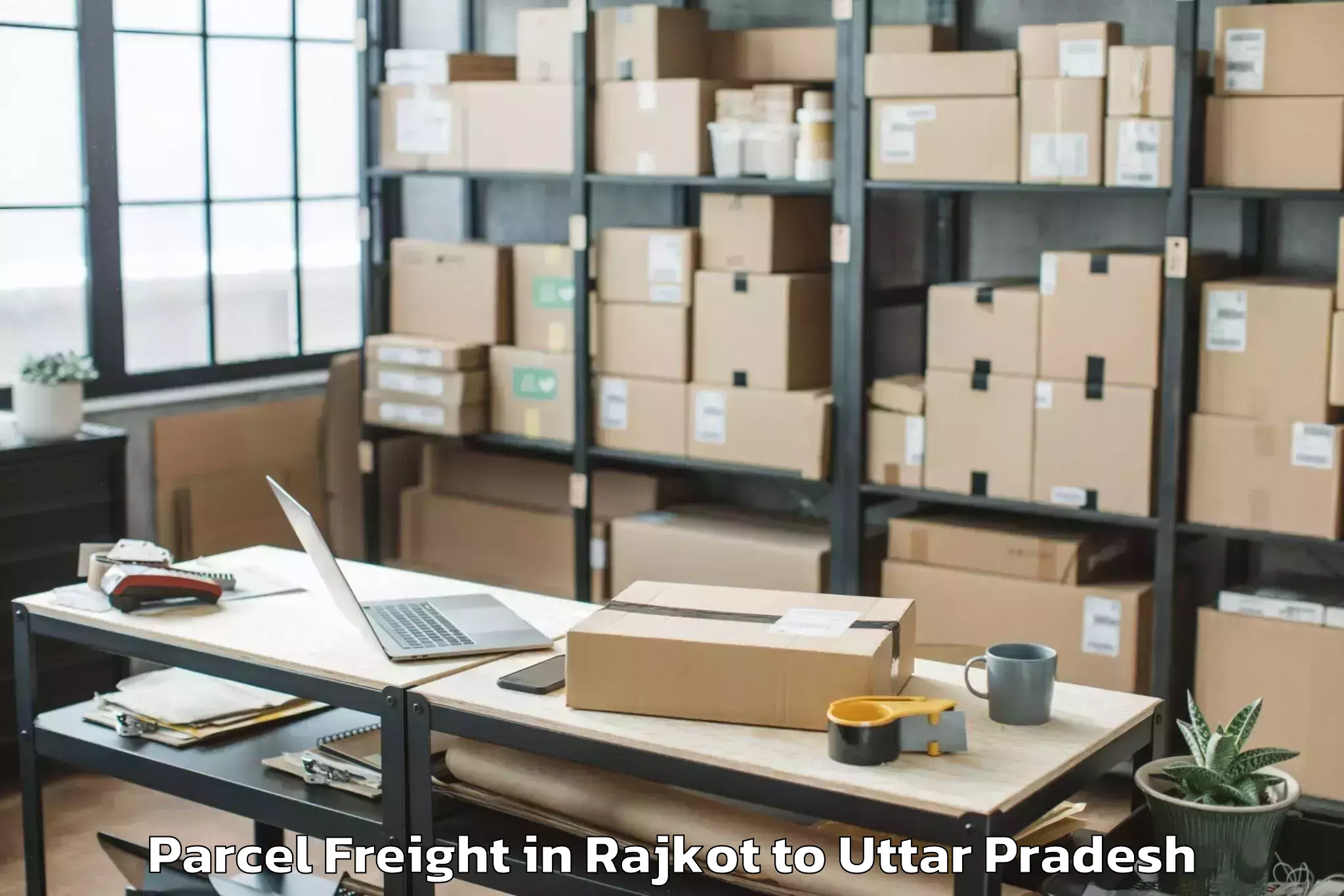 Top Rajkot to Kampil Parcel Freight Available